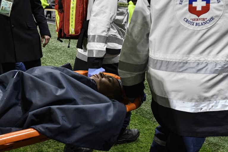 Paris Saint-Germain's forward Kylian Mbappe is carried off on a stretcher
