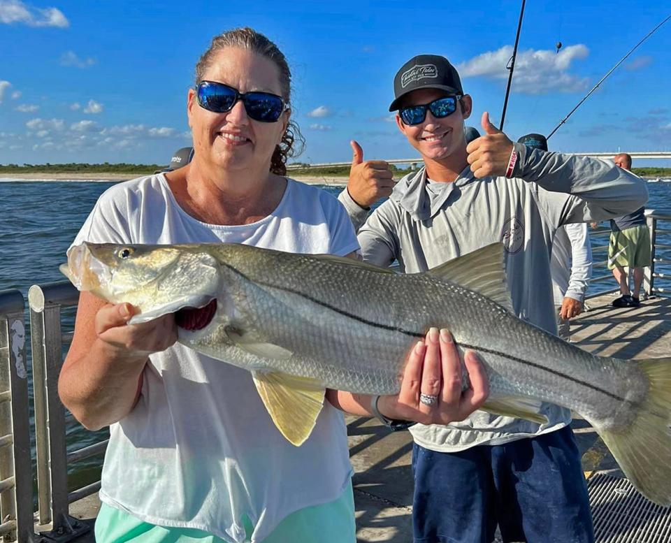 April Nelson of Frostproof caught this 32-inch slot size snook on a live shrimp while fishing at Sebastian Inlet this past weekend.