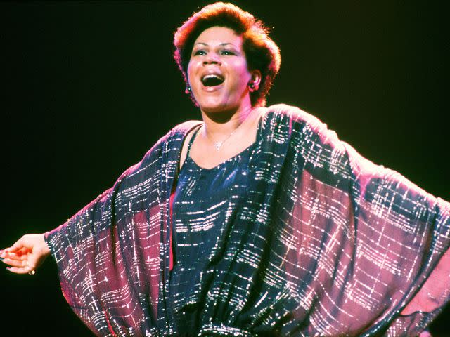 <p>Michael Putland/Getty</p> Minnie Riperton (1947 - 1979) performs on stage, New York, 1977.