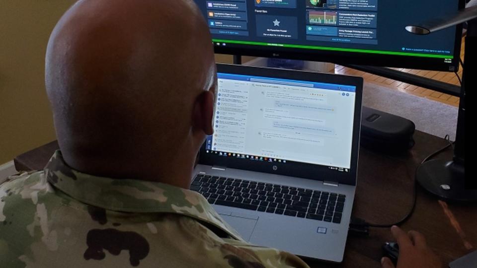 A soldier uses the Army's Vanatge platform to search through service data. (Army photo)