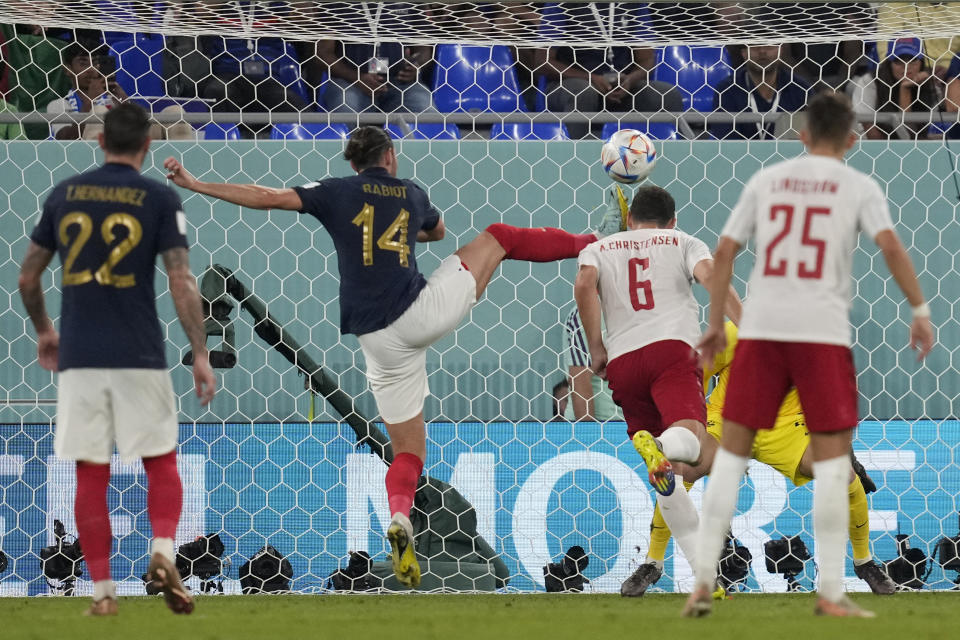 Denmark's Andreas Christensen, 2nd right, scores his sides first goal during the World Cup group D soccer match between France and Denmark, at the Stadium 974 in Doha, Qatar, Saturday, Nov. 26, 2022. (AP Photo/Thanassis Stavrakis)