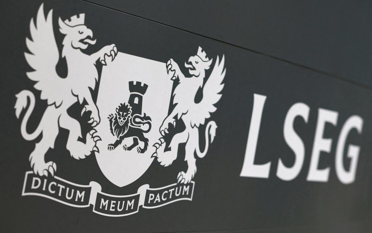 Signage for the London Stock Exchange Group is seen outside of offices in Canary Wharf in London