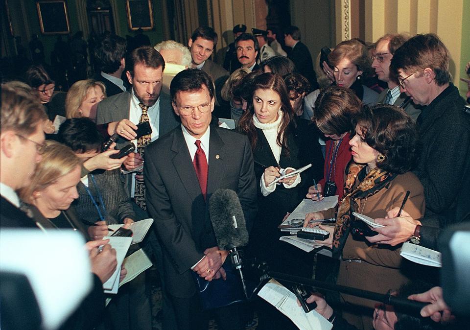 Senate Minority Leader Tom Daschle, (C), D-SD, speaks to reporters after meetings on Capitol Hill in Washington, DC 06 January. Daschle met with other senate members to determine how the impeachment trial of US President Bill Clinton should be conducted.  (Photo: William Philpott/AFP via Getty Images)