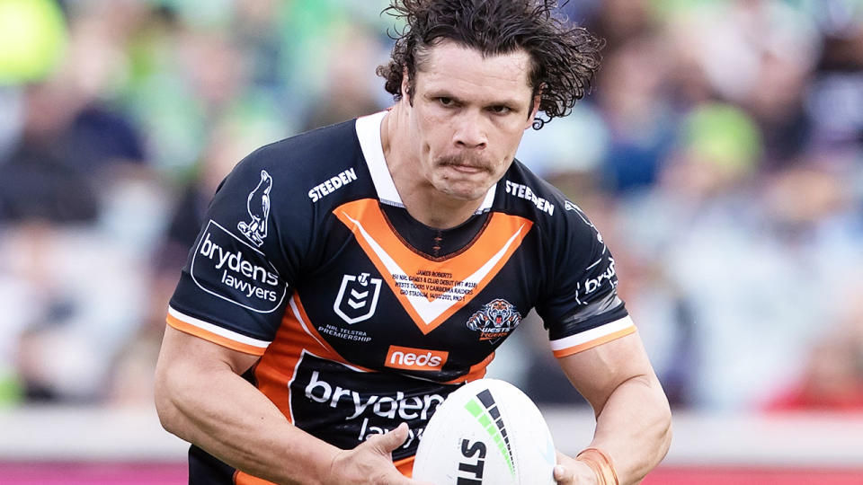 James Roberts, pictured here in action for Wests Tigers against the Canberra Raiders.