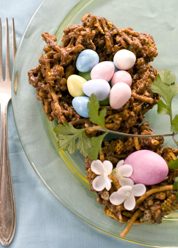 Chocolate bunny nests are seen in this photo taken Monday, Feb. 27, 2012 in Concord, N.H. A blend of crunchy cereals and noodles with a blend of chocolate, marshmallow and peanut butter is used to create edible "nests" to store chocolate eggs and jelly beans. (AP Photo/Matthew Mead)