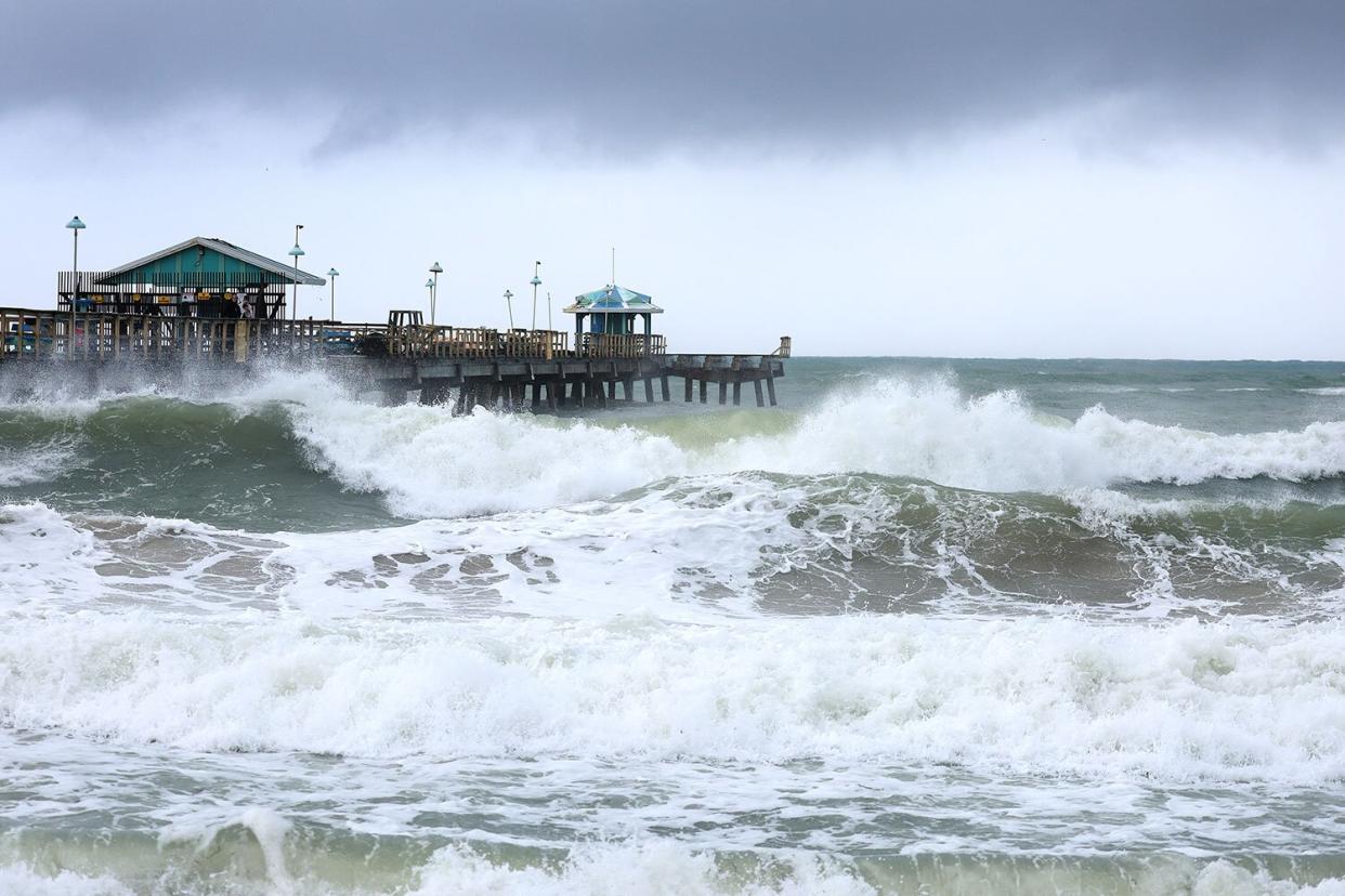 LAUDERDALE-BY-THE-SEA, FLORIDA - NOVEMBER 09: The ocean is whipped up by Tropical Storm Nicole near Anglin's Fishing Pier on November 09, 2022 in Lauderdale-By-The-Sea, Florida. Tropical Storm Nicole could become a Category 1 hurricane before hitting Florida’s east coast by early Thursday. (Photo by Joe Raedle/Getty Images)
