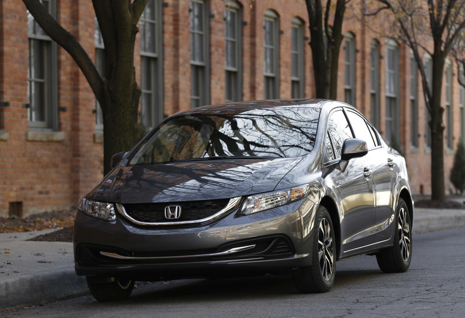 A 2013 Honda Civic is shown in Detroit, Tuesday, Nov. 27, 2012. Just 19 months after its Civic compact car hit showrooms and got slammed by critics, the company has revamped the vehicle, giving it a new look and upgrading the interior. (AP Photo/Paul Sancya)