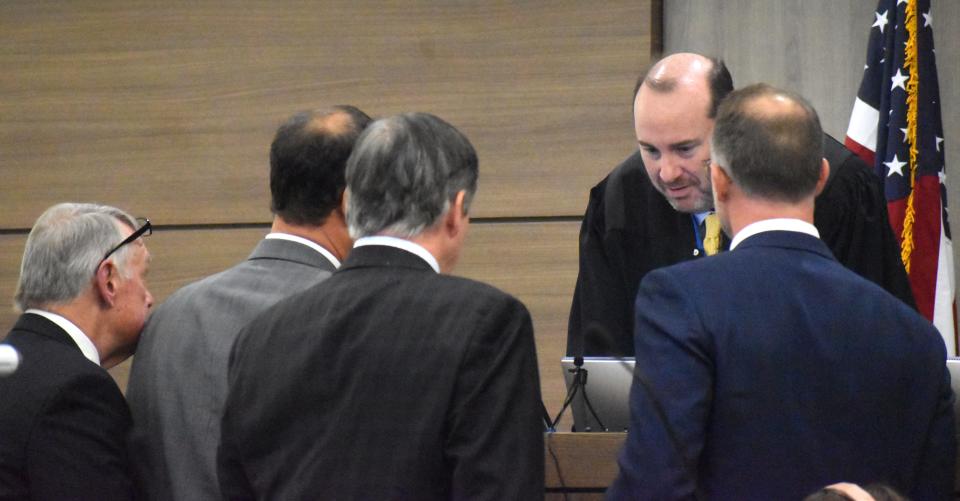 Sarasota Circuit Court Judge Hunter Carroll speaks with attorneys during a sidebar during the third day of the Maya Kowalski civil lawsuit against Johns Hopkins All Children's Hospital on Tuesday, Sept. 26, 2023. Pool photo by Frank DiFiore