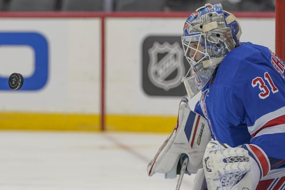 New York Rangers goaltender Igor Shesterkin makes the save against the New Jersey Devils during the first period of an NHL hockey game, Saturday, Jan. 7, 2023, in Newark, N.J. (AP Photo/Mary Altaffer)