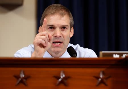 Rep. Jim Jordan (R-OH) questions Democratic presidential candidate Hillary Clinton as she testifies before the House Select Committee on Benghazi, on Capitol Hill in Washington October 22, 2015. REUTERS/Jonathan Ernst