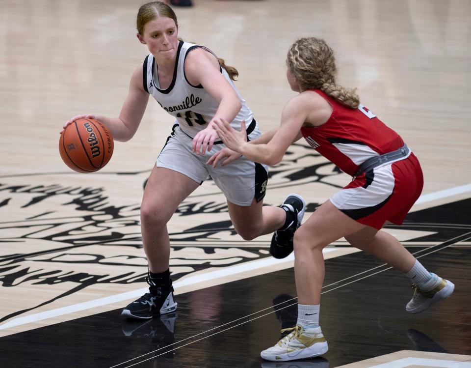 Boonville's Alison Ward (10) is pressured by Princeton's Mallory Watt (2) during their game at Boonville High School Thursday night, Dec. 8, 2022.