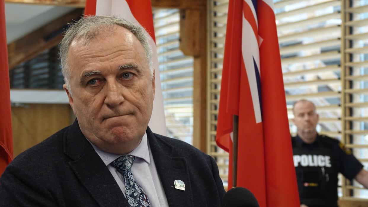 During a news conference Monday, Belleville Mayor Neil Ellis called on the province to step up financial report after the city declared an addiction emergency. (Dan Taekema/CBC - image credit)