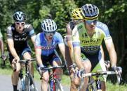 Tinkoff-Saxo team rider Michael Rogers (R) of Australia leads a breakaway group of riders to win the 237.5km 16th stage of the Tour de France cycling race between Carcassonne and Bagneres-de-Luchon, July 22, 2014. REUTERS/Jean-Paul Pelissier