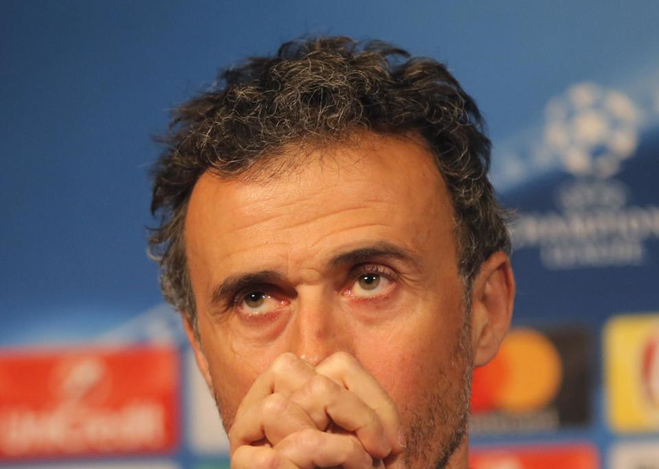 Barcelona's coach Luis Enrique pauses as he speaks during a press conference at the eve of the Champions League soccer match between Paris Saint Germain and Barcelona at the Parc des Princes stadium in Paris, Monday, Feb. 13, 2017. (AP Photo/Michel Euler)