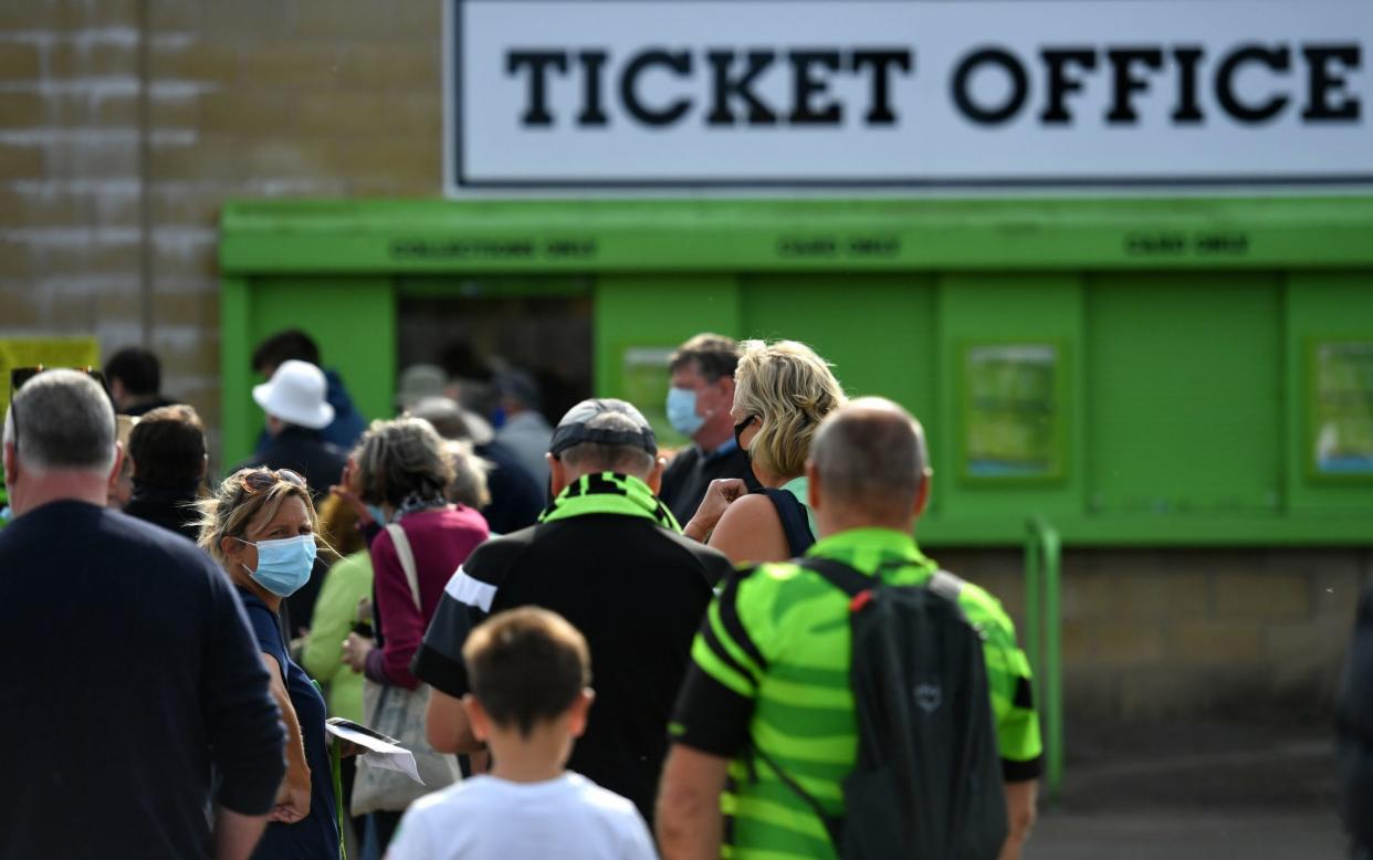 File photo dated 19-09-2020 of Forest Green Rovers fans in arrive in PPE before the Sky Bet League Two match at the New Lawn - PA