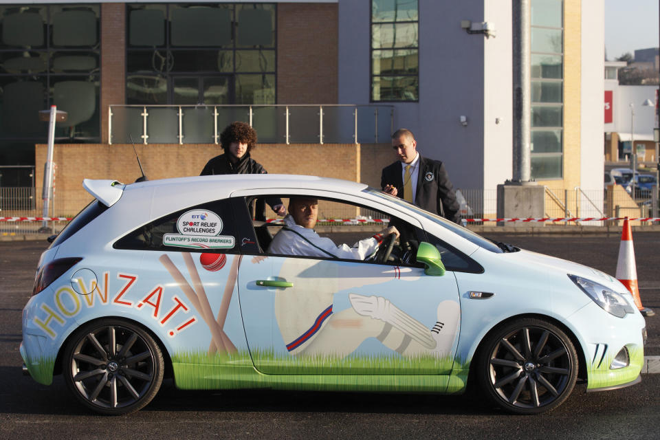 Former England cricketer Andrew "Freddie" Flintoff drives outside Wembley football stadium as he attempts to break the world record for the fastest 3-point turn in a car in London on March 19, 2012. Flintoff was attempting to set twelve Guinness World Records in 12 hours to raise money for the Sport Relief charity. AFP PHOTO / JUSTIN TALLIS (Photo credit should read JUSTIN TALLIS/AFP/Getty Images)