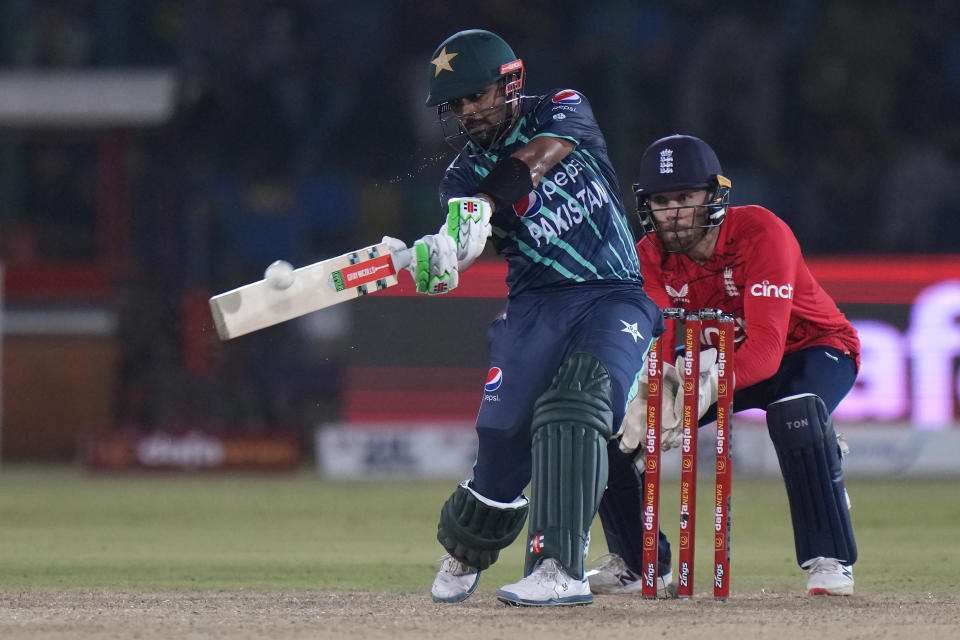 Pakistan's captain Babar Azam plays a shot during the second T20 cricket match between Pakistan and England, in Karachi, Pakistan, Thursday, Sept. 22, 2022. (AP Photo/Anjum Naveed)