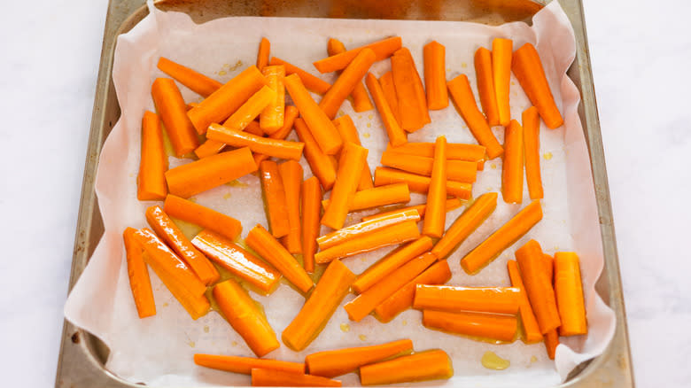 sliced carrots on sheet pan