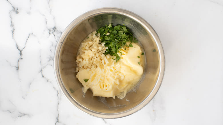 butter garlic parsley in bowl