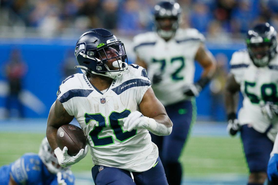 Seattle Seahawks running back Rashaad Penny rushes for a 36-yard touchdown during the second half of an NFL football game against the Detroit Lions, Sunday, Oct. 2, 2022, in Detroit. (AP Photo/Duane Burleson)