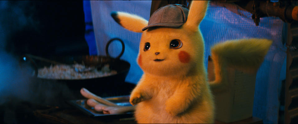 This image released by Warner Bros. Pictures shows the character Detective Pikachu, voiced by Ryan Reynolds, in a scene from "Pokemon Detective Pikachu." (Warner Bros. Pictures via AP)