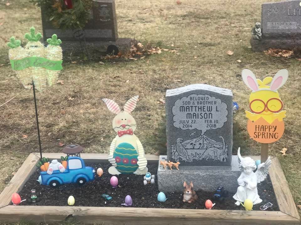 Matthew Maison's grave in March 2023, decorated decorated for spring.