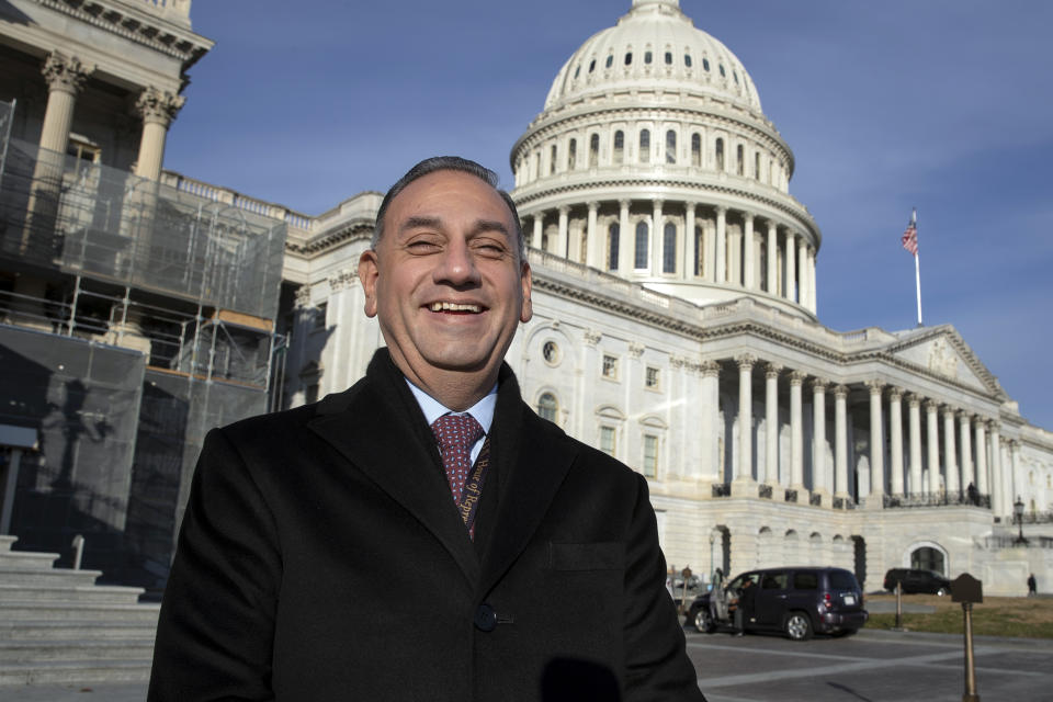 FILE - In this Nov. 29, 2018, file photo, then-Rep.-elect Gil Cisneros, D-Calif., stands in front of the Capitol during a week of orientation for incoming members, in Washington. Republicans are eager to recapture a string of California U.S. House seats a that the party lost in a 2018 rout, but the job is looking tougher: The numbers are running against them. State voter registration statistics show Democrats gaining ground in key battleground districts that the party seized two years ago, on its way to regaining control of the House. (AP Photo/J. Scott Applewhite, File)