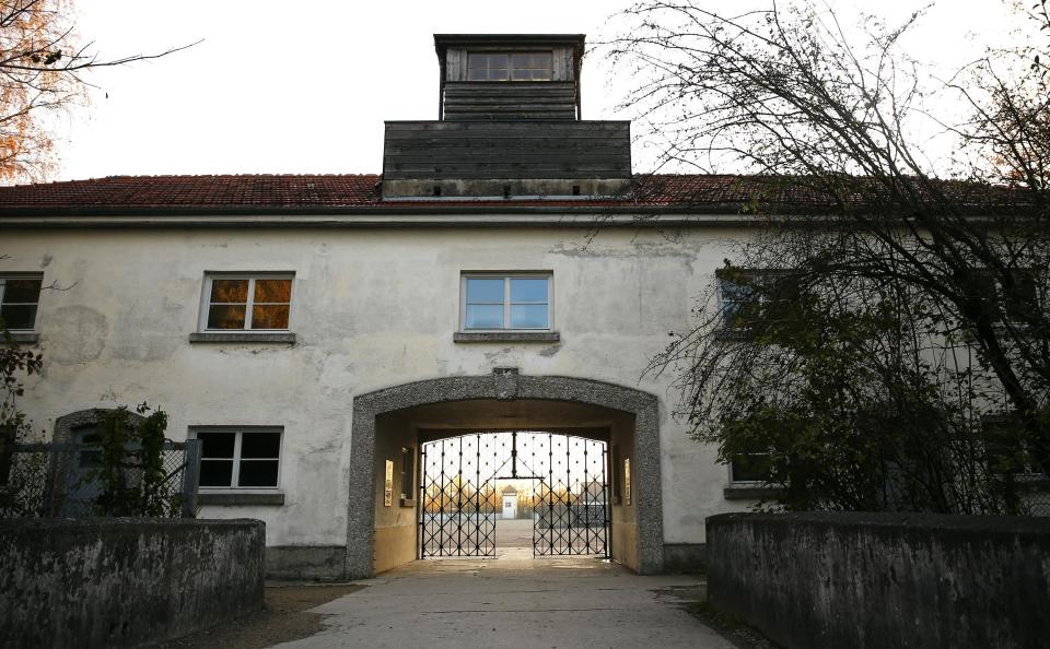 The main gate of the former concentration camp in Dachau near Munich is seen without the stolen door with the Nazi slogan "Arbeit macht frei" (Work sets you free), November 3, 2014. REUTERS/Michael Dalder (GERMANY - Tags: POLITICS SOCIETY TRAVEL CRIME LAW CONFLICT)