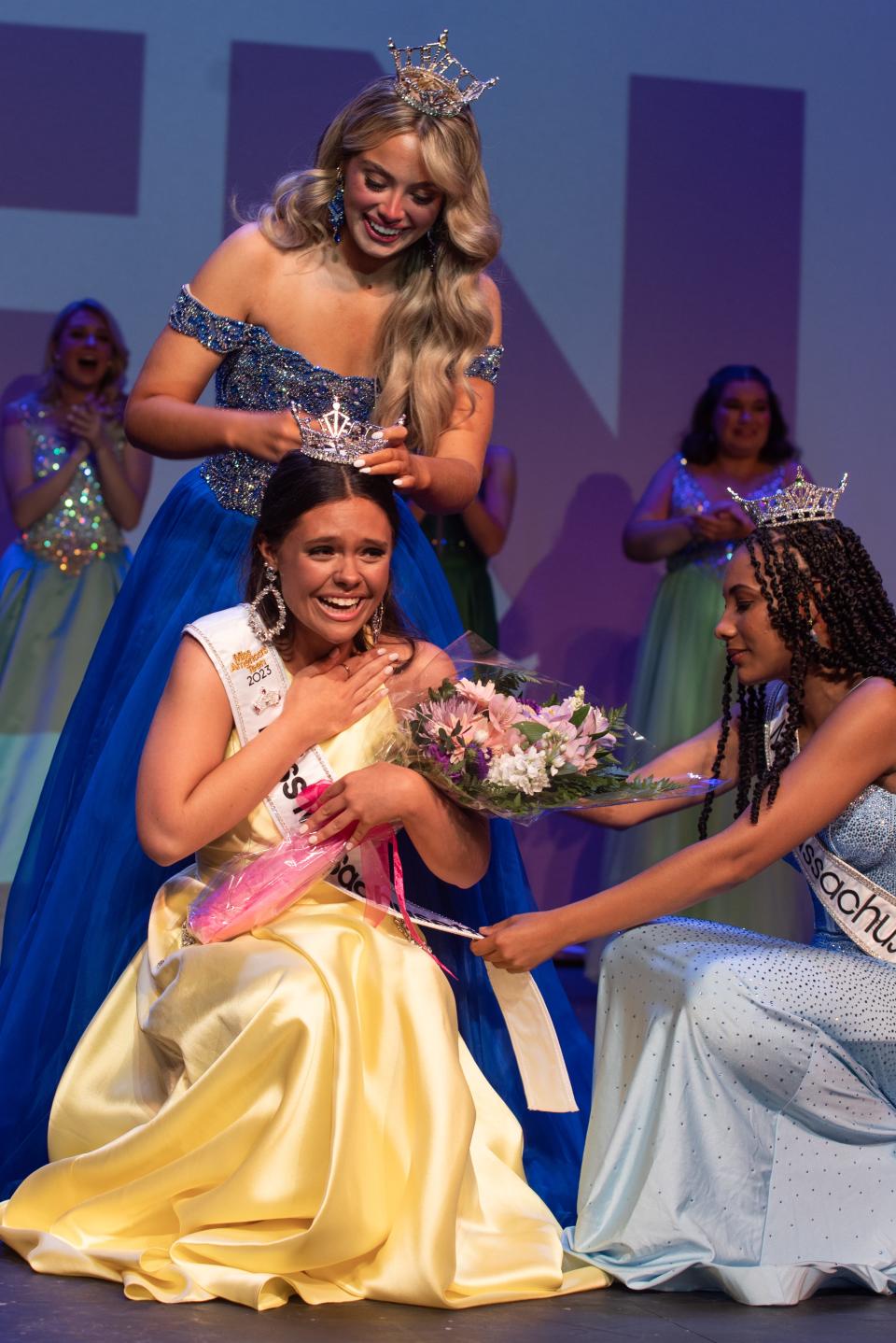 Emma Gibney is crowned by outgoing Miss Massachusetts’ Teen 2022 Jenna McLaughlin and Miss Massachusetts 2022 Katrina Kincade.