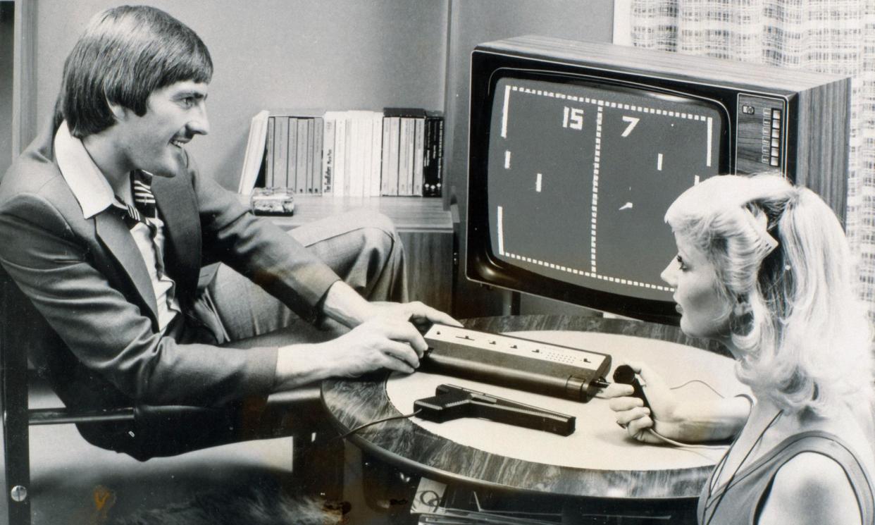 <span>Footballer Steve Heighway plays Pong in 1977. </span><span>Photograph: Manchester Daily Express/SSPL/Getty Images</span>