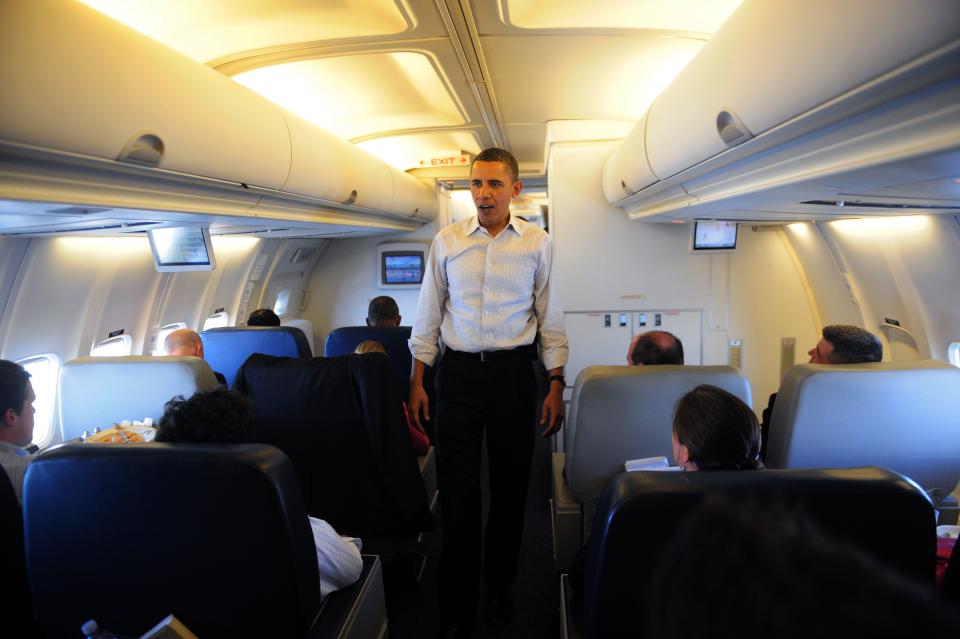 Barack Obama briefing reporters on Air Force One