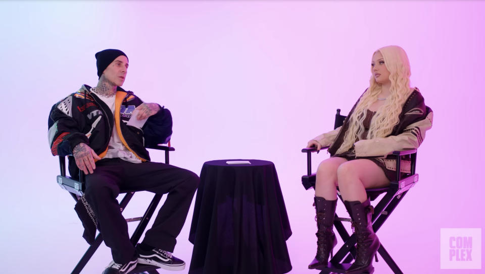 Travis and Alabama sit in directors chairs during an interview