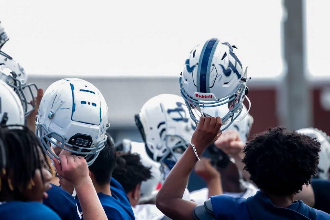 Hickory Ridge chant to signify their unwavering determination and teamwork at the High School football prospect day recruiting showcase at Hickory Ridge High School Kelly Hood