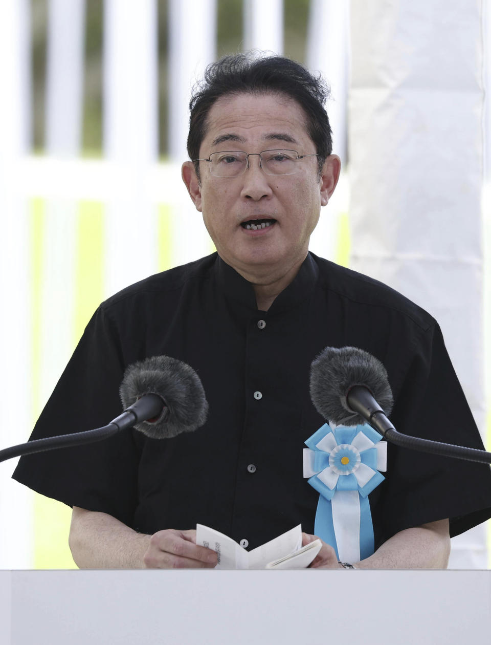 Japan's Prime Minister Fumio Kishida delivers a speech during a memorial ceremony for all war dead in Okinawa at the Peace Memorial Park in Itoman, Okinawa prefecture, southern Japan Friday, June 23, 2023. Japan marked the Battle of Okinawa, one of the bloodiest battles of World War II fought on the southern Japanese island, which ended 78 years ago. (Kyodo News via AP)