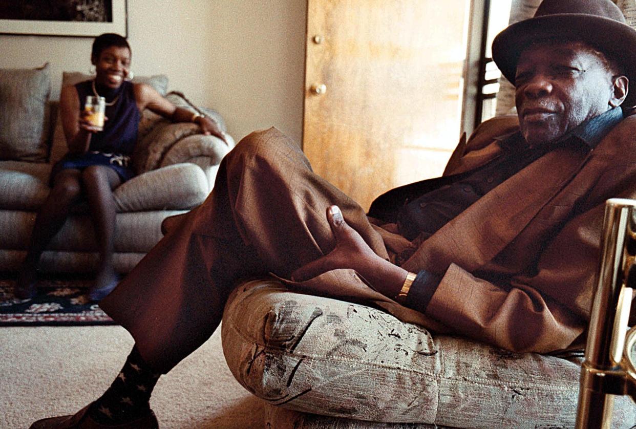 Blues musician John Lee Hooker photographed in his California home in 1993 with his daughter, blues singer Zakiya Hooker (left).