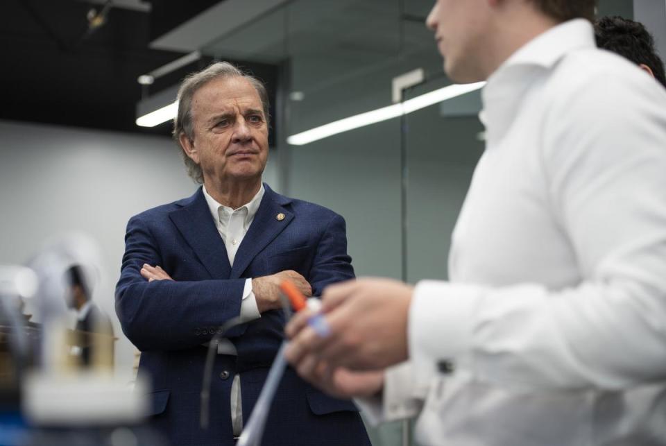 Texas A&M System Chancellor John Sharp listens to a group of engineering medicine students present a project they’ve been working on in the Discovery Tower at Texas A&M Innovation Plaza on Tuesday, March 15, 2022, in Houston.