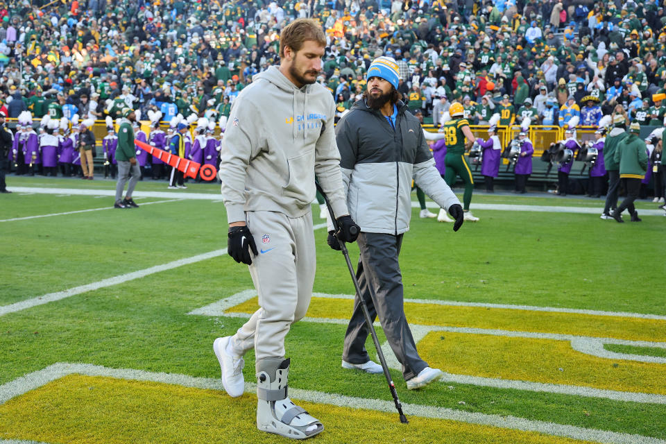 Joey Bosa returned to the field on Sunday with a crutch and a walking boot. (Stacy Revere/Getty Images)