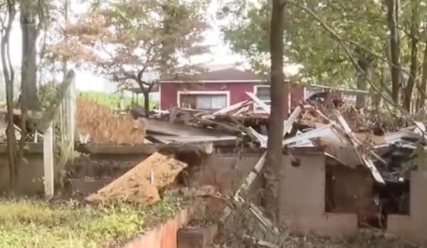 Homeowner's fury as 8ft high pile of 'stinking' rubbish dumped