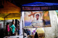 <p>A poster bearing the picture of Ricardo Delemon, who was shot by unidentified gunmen in a drug-related vigilante killing, is seen at his wake in Manila, Philippines on Aug. 11, 2016. (Zeke Jacobs/NurPhoto via Getty Images) </p>