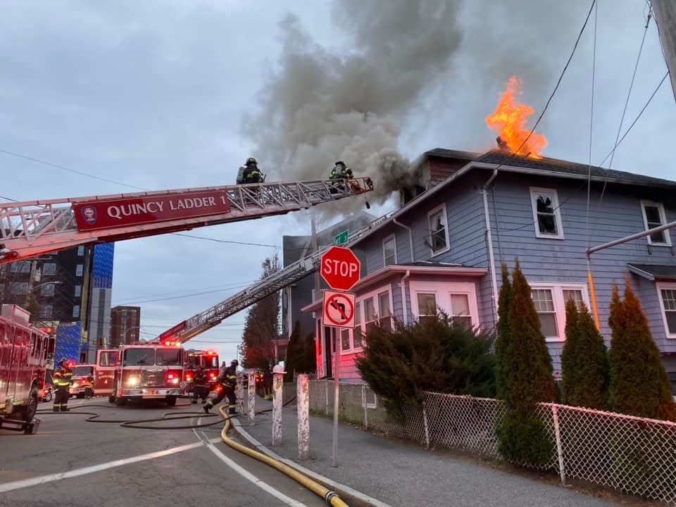 Quincy firefighters battle a blaze on Granite Avenue in Quincy Center on Nov. 28, 2021.