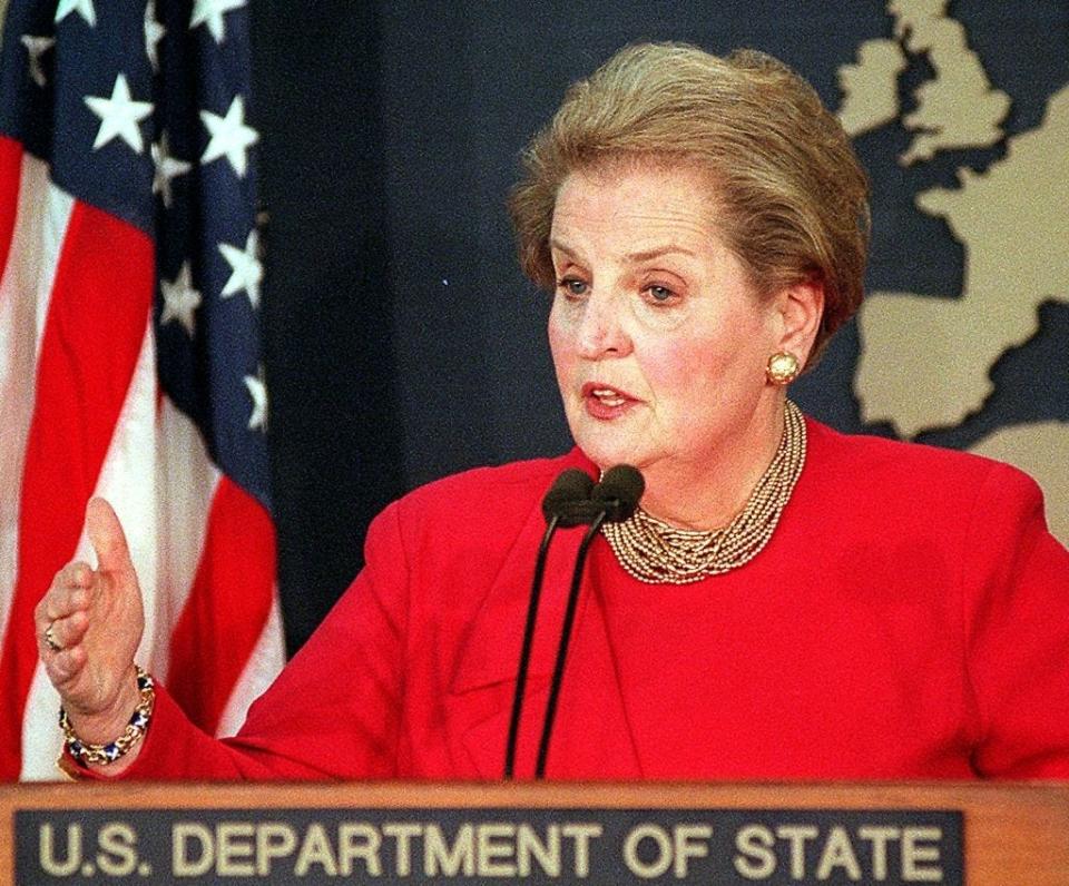 U.S. Secretary of State Madeleine Albright speaks to reporters during a January 1998 news conference about Iraq at the State Department in Washington, D.C.