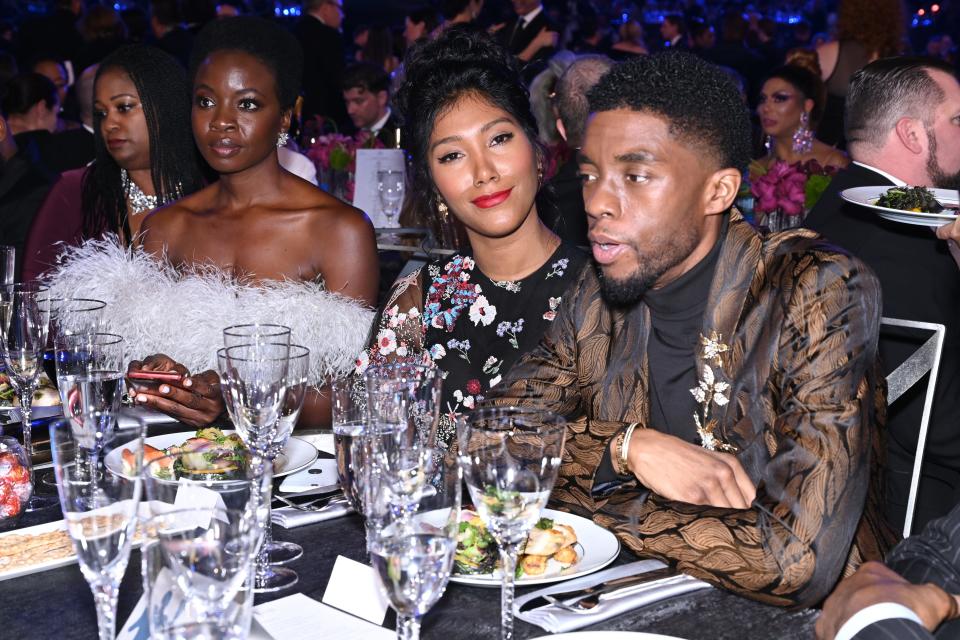 Chadwick Boseman, right, and Taylor Simone Ledward attended the 25th Annual Screen Actors Guild Awards in Los Angeles in 2019. Boseman's 'Black Panther' co-star, Danai Gurira, left, is seated with them.