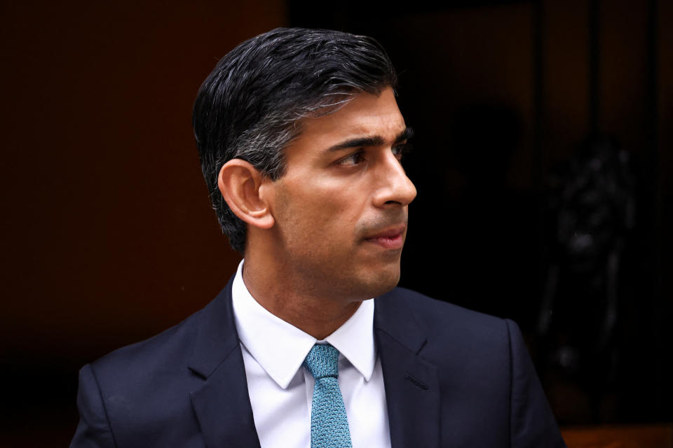 Britain's Prime Minister Rishi Sunak walks outside Number 10 Downing Street, in London, Britain, October 26, 2022. REUTERS/Henry Nicholls