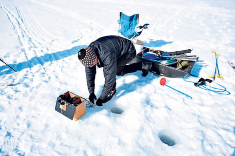 Earn your supper by ice-hole fishing - Credit: © Noah Clayton/Noah Clayton