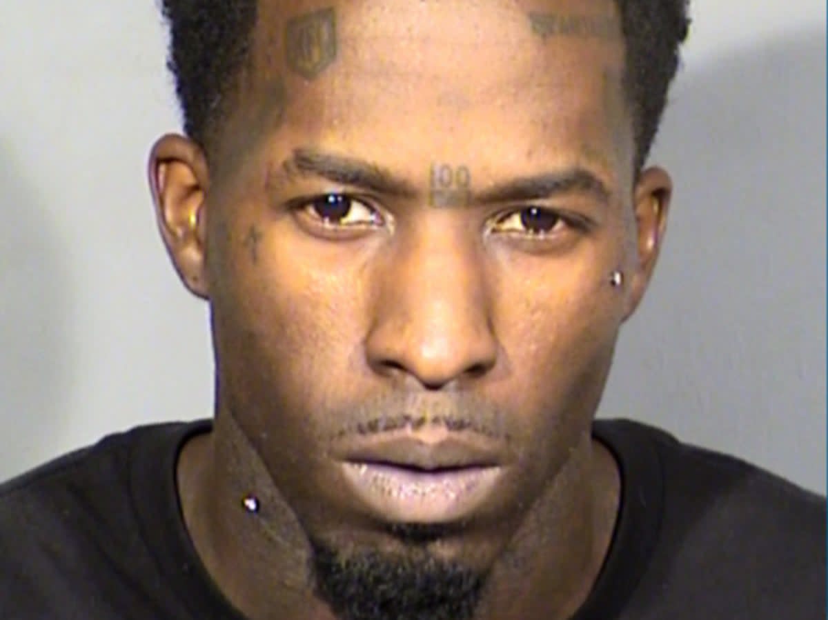 Travis Doss, 31, was incited on 40 counts, including several for child abuse, after police found six children in his Las Vegas apartment with signs of abuse, including two who had been locked in cages (Las Vegas Metro Police)