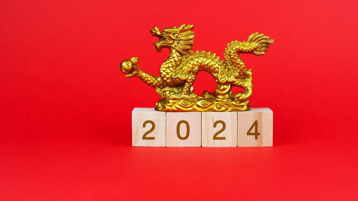 2024 number on wood block year of the dragon concept