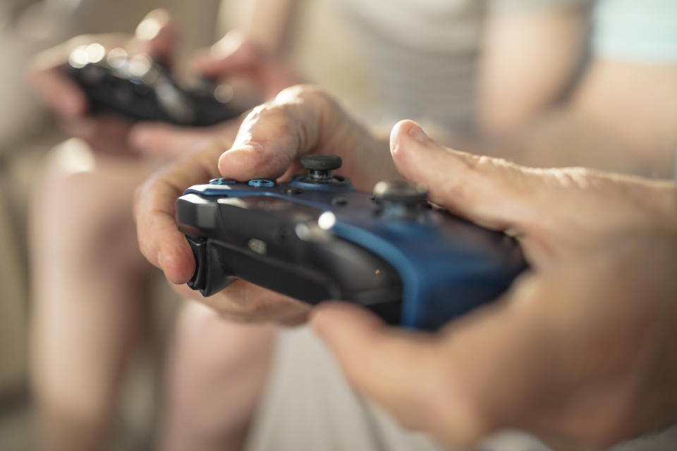 The must-have accessories and games, according to gaming experts. (Photo: Getty Images)