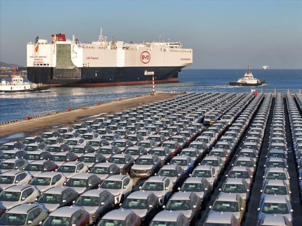 Hundreds of BYD cars on a dock.