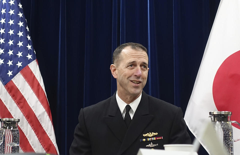 FILE - In this Jan. 18, 2019, file photo, Chief of U.S. Naval Operations Adm. John Richardson talks to reporters on regional security issues in Tokyo. The U.S. Navy's top officer says he urged China to follow international rules at sea to avoid confrontations and insisted that ships should be able to pass safely though the South China Sea and Taiwan Strait. (AP Photo/Mari Yamaguchi, File)