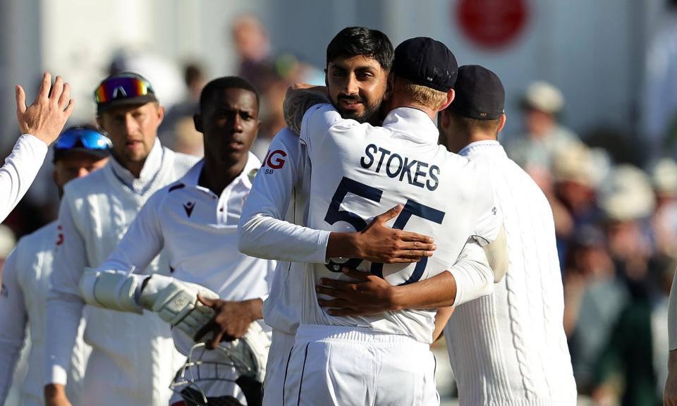 <span>Shoaib Bashir and Ben Stokes embrace after victory was completed.</span><span>Photograph: David Rogers/Getty Images</span>